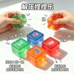 NeeDoh Nice Ice Baby Ice Cube Squeeze Toy 4 Pack Soda Drink Theme Clear Ice Cube Squishy Super Solid Squish Stress Relief Sensory Fidget Toy view 3